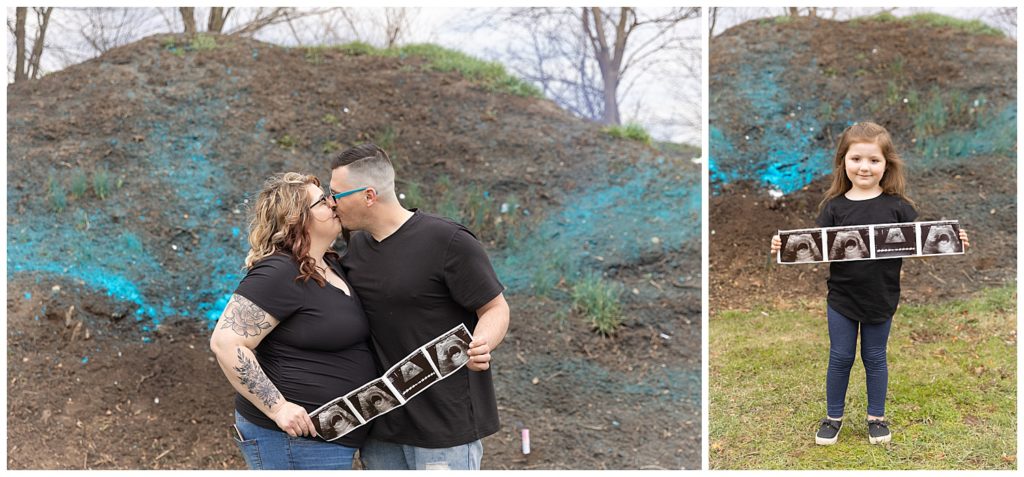 family in front of blue explosion holding baby ultrasound images